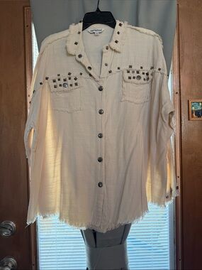Blouse by Davi & Dani size medium. Beige with metallic studs and snaps